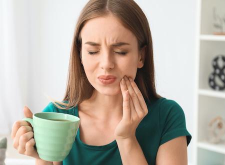 Woman with jaw pain | Beaverton Dentist