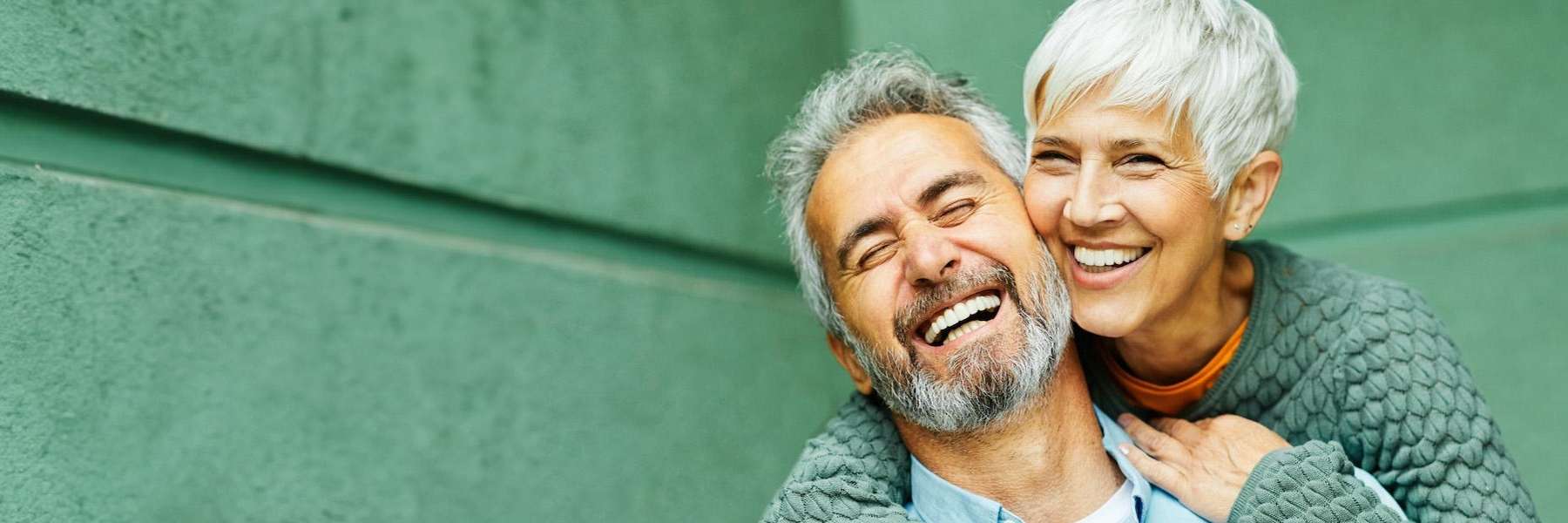 man and woman smiling